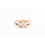 An 18 carat gold diamond solitaire ringthe round brilliant cut diamond estimated to weigh approx 0.