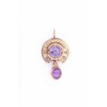 A Victorian yellow metal (tests 18 carat gold) amethyst broochwith a later paste set gilt metal