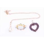 A yellow metal and rose-cut garnet heart-shaped pendantthe suspension loop marked 14K, 2 cm wide,