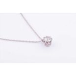 A solitaire diamond pendantthe round brilliant-cut diamond of approximately 1.10 carats, suspended