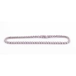 An 18ct white gold and diamond line braceletthe diamonds of approximately 1.0 carats combined,