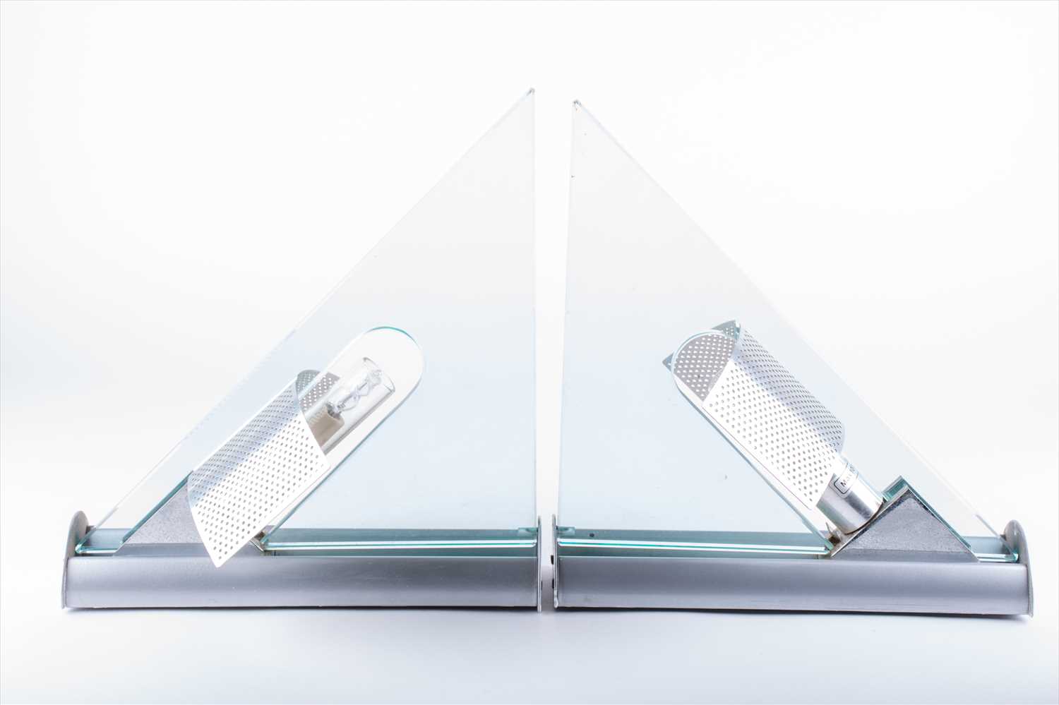 A pair of Italian Artemide ‘Icaro’ wall lampsdesigned by Carlo Forcolini c1985, perforated metal,