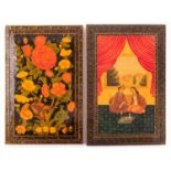 Two Persian Qajar lacquer mirror casesto include one decorated with blooming flowers, the other with