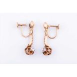 A pair of diamond drop earringswith screw fittings, marked 14k, drop approx 3 cm, estimated total