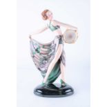 An Art Deco Goldscheider ceramic figure by Josef Lorenzl: 'Tambourine Dancer' modelled in floral