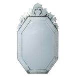 A 20th century Venetian octagonal glass wall mirror of foliate scroll design.131 cm x 75 cm