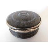 A Geo III press moulded tortoiseshell snuff box, of waisted drum form with silver coloured mounts