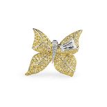 An unusual 18ct yellow gold and diamond butterfly ring, one wing set with a tapered baguette-cut