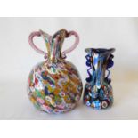 Two Murano glass millefiore twin handled vases, early - mid 20th century, each with a shaped rim and