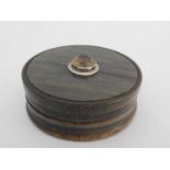 A 19th century horn snuff box, the lid set with citrine mounted in white metal, the base bevelled