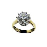 An 18ct yellow gold hallmarked single stone diamond ring, set with an old brilliant cut diamond of