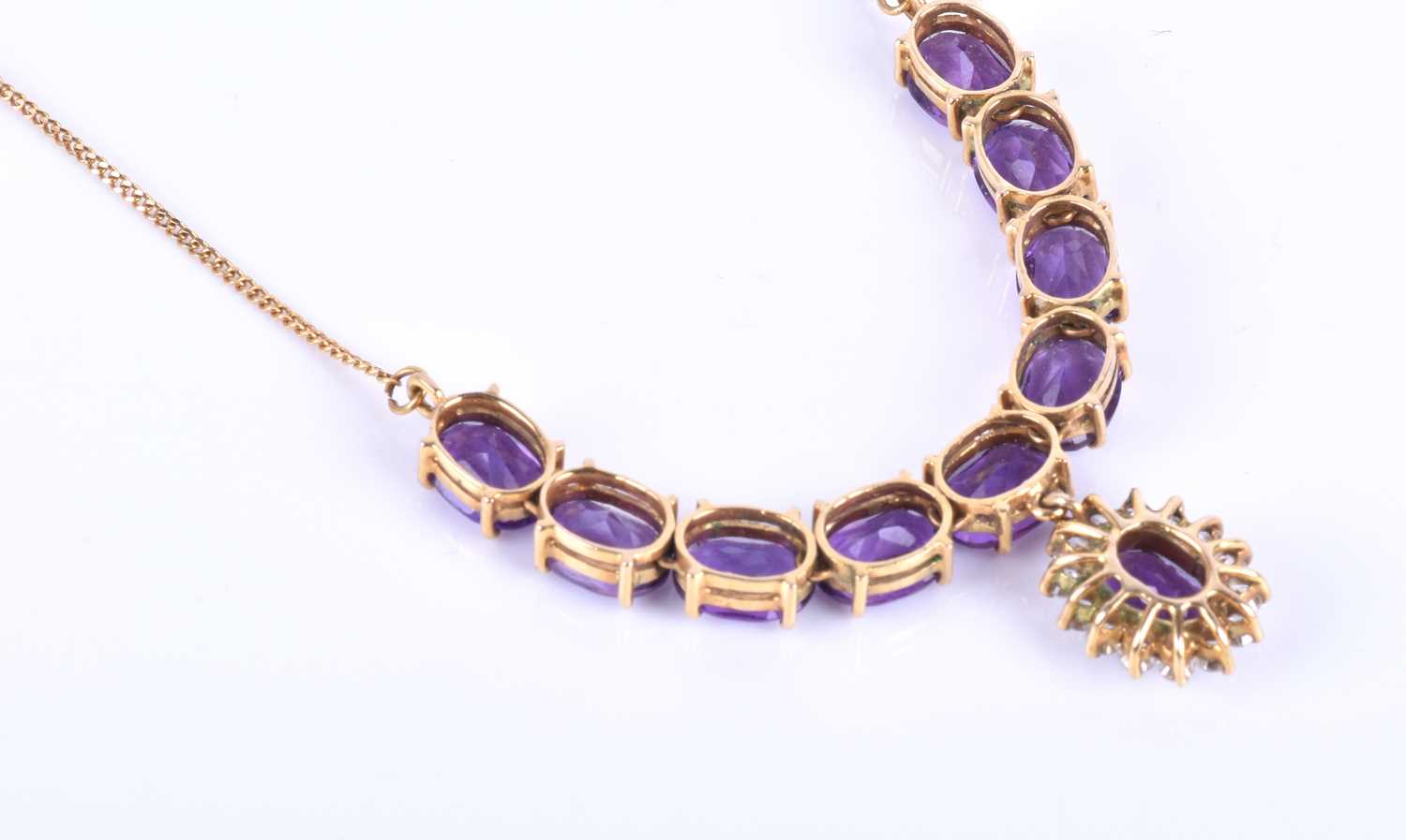 A 14ct yellow gold, amethyst and CZ necklace, set with an articulated line of mixed oval-cut - Image 2 of 5