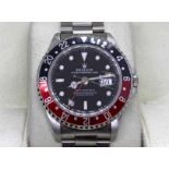 A 1994 Rolex GMT Master II ‘Coke’ ref. 16710 stainless steel wristwatch, with red and black bezel,