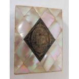 A 19th century mother of pearl card case, the front inset with engraved white metal lozenge, with