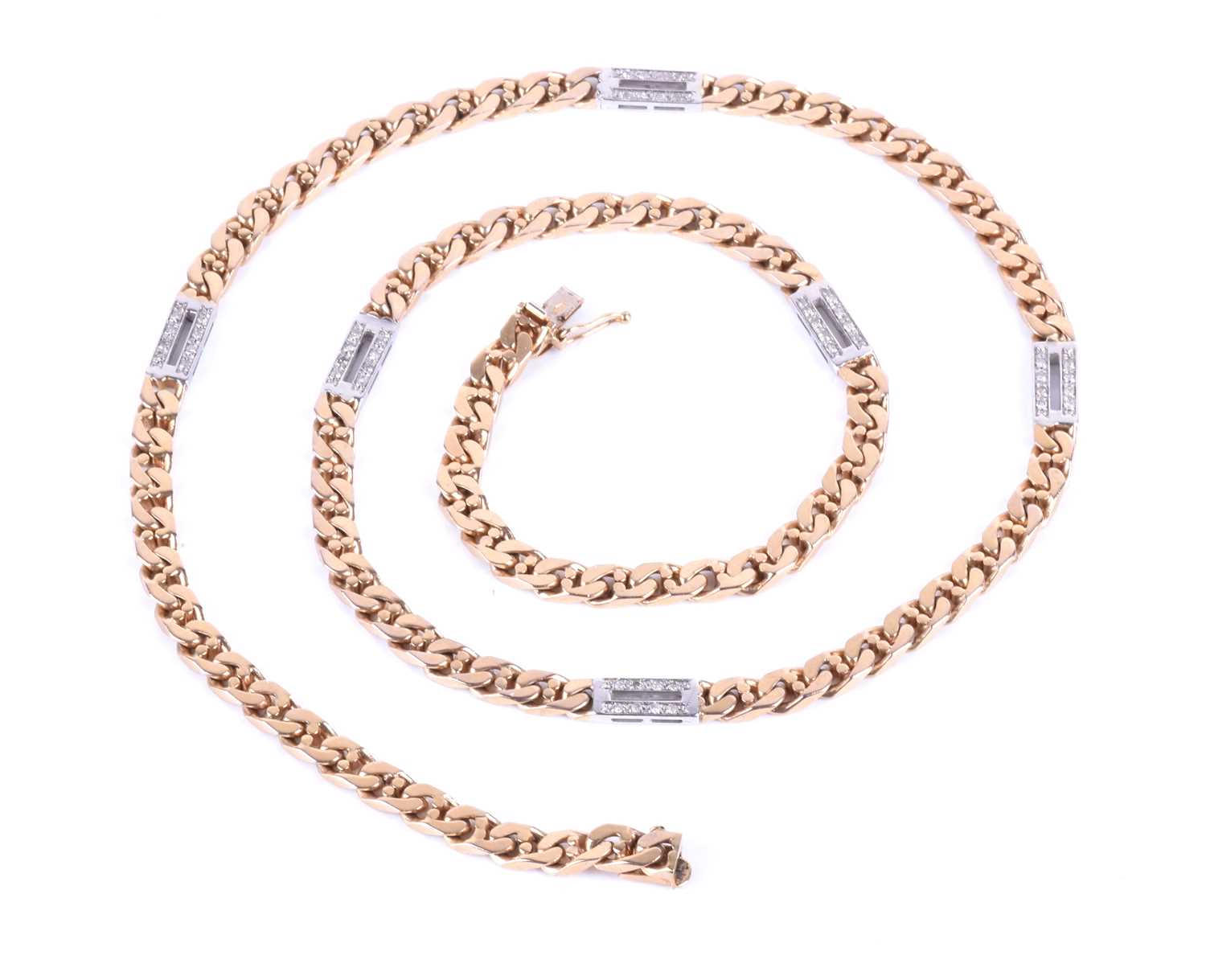 A 9ct yellow gold and diamond necklace, of flattened curb-links, interspersed with rectangular