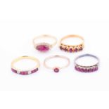 A yellow metal and ruby ring, set with five stones, size K, together with a yellow metal and