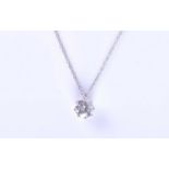 A solitaire diamond pendant, the round brilliant-cut diamond of approximately 1.10 carats, suspended