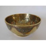 A Cairo ware onlaid brass bowl, late 19th/early 20th century, decorated throughout with white
