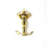 An 18ct yellow gold crown and anchor pendant, set with a cabochon amethyst, diamonds and sapphires,