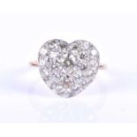 A fine heart-shaped diamond cluster ring, set with round-cut diamonds of different sizes, the