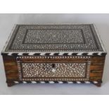 An Anglo Indian teak and bone inlaid box, circa 1850, inlaid throughout with scrolling arabesques