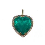 A fine and large 18ct yellow gold emerald and diamond pendant, set with central heart shaped