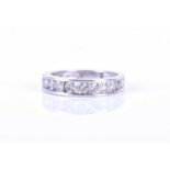 A 10k white gold and diamond half eternity ring, channel-set with round brilliant-cut diamonds, size