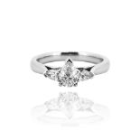 Frost of London. A platinum and pear shaped diamond engagement ring, set with pear shaped diamond