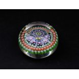 A Perthshire paperweight type PP28, c. 1975-1972, designed with concave top, concentric millefiori