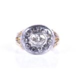 A 19th century diamond cluster ring, the oval silver mount centred with a bezel-set mixed oval-cut