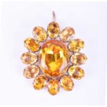 A 19th century yellow gold and citrine cluster pendant, of oval form, centred with an oval-cut