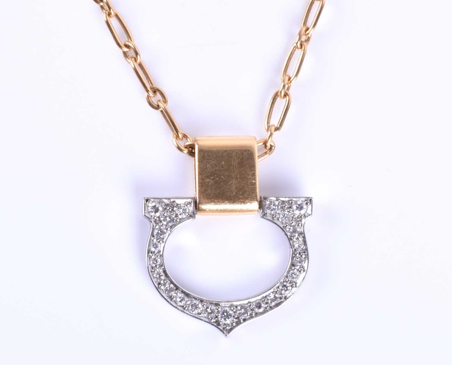 Cartier. An 18ct yellow gold and diamond 'C de Cartier' pendant, the white gold inverted 'C' pave- - Image 9 of 10