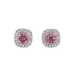 A pair of 18ct white gold and fancy pink and brown diamond earrings, each set with a central