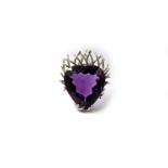 A white metal mounted heart-shaped amethyst brooch, set with a mixed heart-cut amethyst of