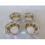 A set of four Canadian silver nut dishes, early 20th century, each with scroll decorated rim, struck