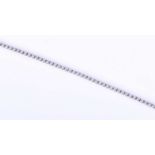 An 18ct white gold and diamond line bracelet, set with small round-cut diamonds of approximately 1.0