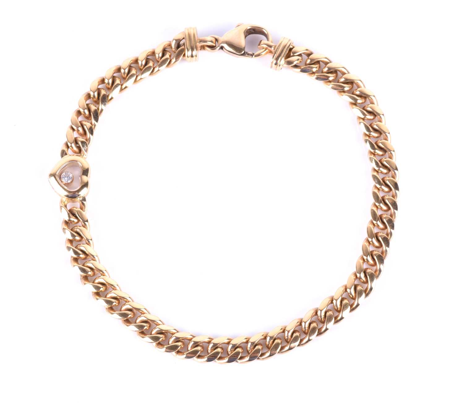 Chopard. An 18ct yellow gold Happy Diamond bracelet, set with a heart-shaped segment inset with a '