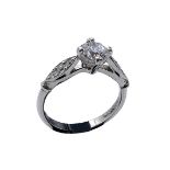 A .950 platinum and diamond ring, the central HRD certificated brilliant-cut diamond of F colour and