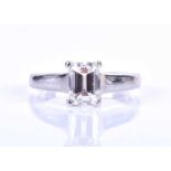 A fine quality platinum and diamond ring, set with an emerald-cut diamond of 1.17 carats, colour
