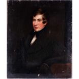 English school, mid 19th century, depicting a half-length portrait of a young gentleman wearing a