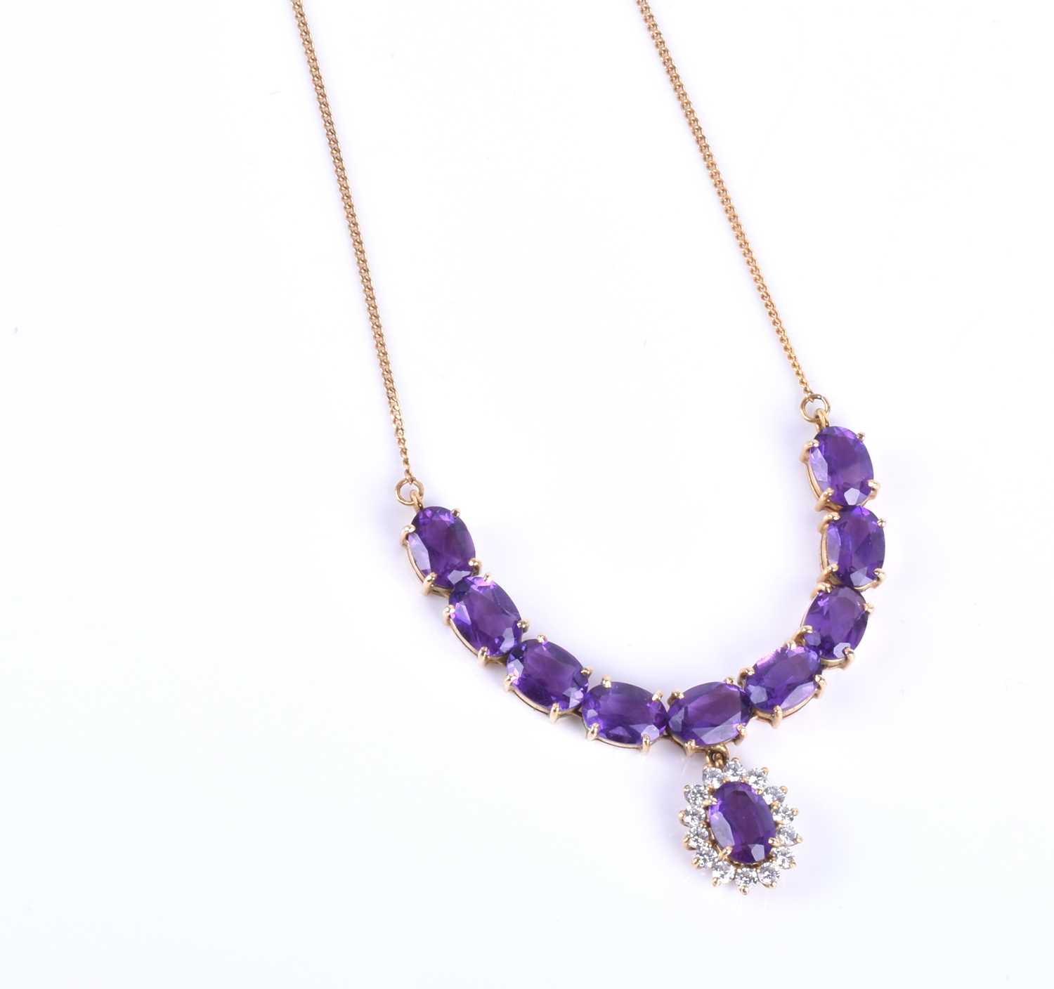 A 14ct yellow gold, amethyst and CZ necklace, set with an articulated line of mixed oval-cut - Image 4 of 5