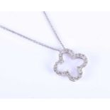 An 18ct white gold and diamond pendant, of openwork quatrefoil form, inset with round brilliant-