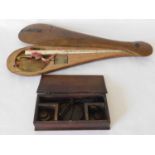 A late 18th century coin scale and weights in fruitwood case, the steel beam supporting circular