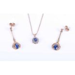 A pair of 9ct yellow gold, diamond and sapphire drop earrings, each set with a mixed oval-cut