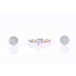 A 9ct yellow gold and solitaire diamond ringset with a round brilliant-cut stone of approximately