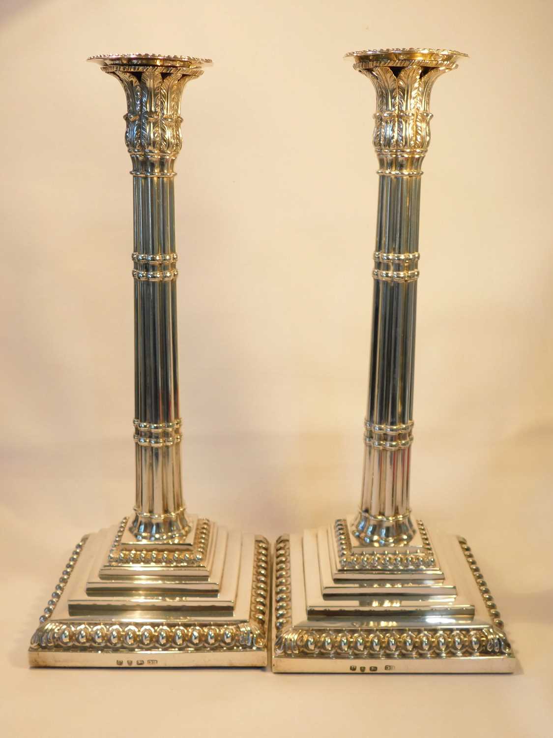 A good pair of early George III silver candlesticks, Ebenezer Coker, London 1770, the gadrooned