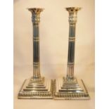 A good pair of early George III silver candlesticks, Ebenezer Coker, London 1770, the gadrooned