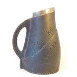 An Edwardian Doulton Lambeth silver mounted Black Jack jug, inscribed ' Drinke Faire - Don't Sware',