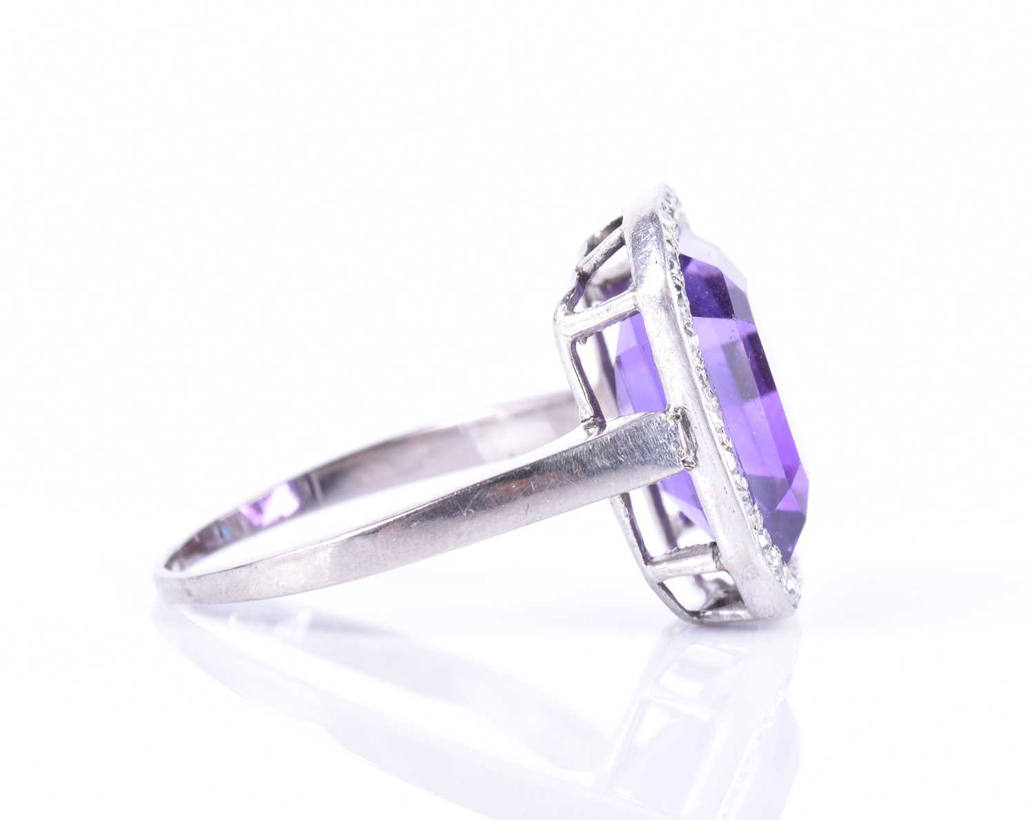 A diamond and amethyst cocktail ringin the Art Deco style, set with an emerald-cut amethyst within - Image 6 of 7