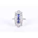 An Art Deco diamond and sapphire cocktail ringthe shaped rectangular panel mount centred north to